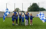 11 August 2019; Dublin duo hurler Eamonn Dillon and camogie player Siobhan Kehoe both from Naomh Fionbarra GAA Club are pictured with young Naomh Fionnbarr players at the launch of Community Credit Union’s 10-year sponsorship of the new ‘Community Park’ pitch at Naomh Fionnbarra GAA Club in Cabra, Dublin, marking the first day of Naomh Fionnbarra’s Festival Week 2019. Photo by Harry Murphy/Sportsfile