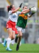 11 August 2019; Marie Cranny, Bennekerry NS, Bennekerry, Carlow, representing Kerry, in action against Ella Treacey, St. Mary’s PS, Cookstown, Tyrone, representing Tyrone, during the INTO Cumann na mBunscol GAA Respect Exhibition Go Games during the GAA Football All-Ireland Senior Championship Semi-Final match between Kerry and Tyrone at Croke Park in Dublin. Photo by Brendan Moran/Sportsfile