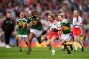 11 August 2019; Alexandra Peter, Castlerara NS, Drumohan, Cavan, representing Kerry, in action against Ellie Mulroe, Scoil Treasa Senior NS, Firhouse, Dublin, representing Tyrone, during the INTO Cumann na mBunscol GAA Respect Exhibition Go Games during the GAA Football All-Ireland Senior Championship Semi-Final match between Kerry and Tyrone at Croke Park in Dublin. Photo by Eóin Noonan/Sportsfile
