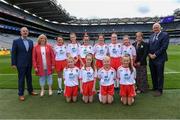 11 August 2019; INTO General Secretary John Boyle, LGFA President Marie Hickey, Cumann na mBunscol President Mairéad O'Callaghan, Uachtarán Chumann Lúthchleas Gael John Horan, with the Tyrone team, back row, left to right, Amy Jo Kierans, Latnamard, Smithborough, Monaghan, Emir Rooney, Scoil Ursula, Strandhill, Road Sligo, Ella Treacey, St. Mary's PS, Cookstown, Tyrone, Méabh McGoldrick, Ovens NS, Ovens, Cork, Rachael Brennan, Holy Family NS, Tubbercurry, Sligo, Ellie Mulroe, Scoil Treasa Senior NS, Firhouse, Dublin, front row, left to right, Ella Maguire, St. Anneís NS, Shankill, Dublin, Grace O'Shea, Scoil Mhuire, Howth, Dublin, Kate Murray, Clooneyquinn NS, Castlerea, Roscommon, Bébhínn McDonald, Ballythomas NS, Gorey, Wexford, ahead of the INTO Cumann na mBunscol GAA Respect Exhibition Go Games during the GAA Football All-Ireland Senior Championship Semi-Final match between Kerry and Tyrone at Croke Park in Dublin. Photo by  Piaras Ó Mídheach/Sportsfile