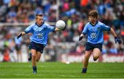 10 August 2019; Dáire Tracey, The Good Shepherd PS, Good Shepherd Road, Antrim, left, and Gavin Murphy, Scoil Mhuire Naofa, Rhode, Offaly, both representing Dublin, during the INTO Cumann na mBunscol GAA Respect Exhibition Go Games during the GAA Football All-Ireland Senior Championship Semi-Final match between Dublin and Mayo at Croke Park in Dublin. Photo by Sam Barnes/Sportsfile