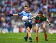 10 August 2019; Dáire Tracey, The Good Shepherd PS, Good Shepherd Road, Antrim, representing Dublin, in action against Sean Gallahue, Anglesboro NS, Anglesboro, Limerick, representing Mayo, during the INTO Cumann na mBunscol GAA Respect Exhibition Go Games during the GAA Football All-Ireland Senior Championship Semi-Final match between Dublin and Mayo at Croke Park in Dublin. Photo by Sam Barnes/Sportsfile