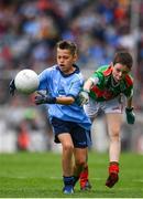 10 August 2019; Dáire Tracey, The Good Shepherd PS, Good Shepherd Road, Antrim, representing Dublin, in action against Sean Gallahue, Anglesboro NS, Anglesboro, Limerick, representing Mayo, during the INTO Cumann na mBunscol GAA Respect Exhibition Go Games during the GAA Football All-Ireland Senior Championship Semi-Final match between Dublin and Mayo at Croke Park in Dublin. Photo by Sam Barnes/Sportsfile