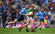 10 August 2019; Charlie McGrath, Ballyholland PS,Newry, Down, representing Mayo, in action against Jacob Comiskey, Holy Family National School, Rathcoole, Dublin, during the INTO Cumann na mBunscol GAA Respect Exhibition Go Games during the GAA Football All-Ireland Senior Championship Semi-Final match between Dublin and Mayo at Croke Park in Dublin. Photo by Sam Barnes/Sportsfile