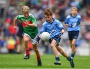 10 August 2019; Cormac Flynn, Scoil Mhuire, Newtownforbes, Longford, representing Dublin,  in action against Charlie McGrath, Ballyholland PS,Newry, Down, representing Mayo, during the INTO Cumann na mBunscol GAA Respect Exhibition Go Games during the GAA Football All-Ireland Senior Championship Semi-Final match between Dublin and Mayo at Croke Park in Dublin. Photo by Sam Barnes/Sportsfile