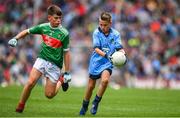 10 August 2019; Dáire Tracey, The Good Shepherd PS, Good Shepherd Road, Antrim, representing Dublin, in action against Cillian Twohig, Kilmeen NS, Clonakilty ,Cork, representing Mayo, during the INTO Cumann na mBunscol GAA Respect Exhibition Go Games during the GAA Football All-Ireland Senior Championship Semi-Final match between Dublin and Mayo at Croke Park in Dublin. Photo by Sam Barnes/Sportsfile