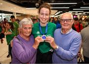 12 August 2019; Member of the Ireland basketball bronze medallist squad, Rachel Huijsdens is greeted by her grandparents Bernie and Vincent Lane, from Dunsaughlin, Meath, on her return from the FIBA U20 Women’s European Championships Division B Finals, held in Kosovo, at Dublin Airport in Dublin. Photo by Stephen McCarthy/Sportsfile