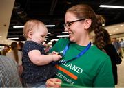 12 August 2019; Strength and conditioning coach with the Ireland basketball bronze medallist squad Elaine Kennington is greeted by her niece 11-month-old Mia O'Carroll on her return from the FIBA U20 Women’s European Championships Division B Finals, held in Kosovo, at Dublin Airport in Dublin. Photo by Stephen McCarthy/Sportsfile