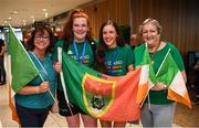 12 August 2019; Members of the Ireland basketball bronze medallist squad Maggie Byrne, left, and Dayna Finn, both from Kiltimagh, Mayo, pose for a photograph with Rita Campbell, left, and Vera McKeon right, on their return from the FIBA U20 Women’s European Championships Division B Finals, held in Kosovo, at Dublin Airport in Dublin. Photo by Stephen McCarthy/Sportsfile