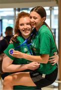 12 August 2019; Claire Melia, left, and Enya Maguire of the Ireland basketball bronze medallist squad on their return from the FIBA U20 Women’s European Championships Division B Finals, held in Kosovo, at Dublin Airport in Dublin. Photo by Stephen McCarthy/Sportsfile