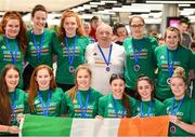 12 August 2019; Head coach Martin Conroy with members of the Ireland basketball bronze medallist squad on their return from the FIBA U20 Women’s European Championships Division B Finals, held in Kosovo, at Dublin Airport in Dublin. Photo by Stephen McCarthy/Sportsfile