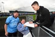 12 August 2019; Brian Fenton of Dublin signs an autograph for Shauna Morgan from Coolock and Jordan Fahey from Blanchardstown, Co Dublin during a meet and greet at Parnell Park in Dublin. Photo by David Fitzgerald/Sportsfile