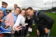 12 August 2019; Dean Rock of Dublin takes a selfie with supporters, from left, Isabella Lopez, Mia Gill and Kayla Reid, all age 13, from Lucan, Co Dublin during a meet and greet at Parnell Park in Dublin. Photo by David Fitzgerald/Sportsfile