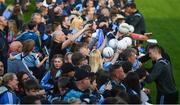 12 August 2019; Dublin players sign autographs during a meet and greet at Parnell Park in Dublin. Photo by David Fitzgerald/Sportsfile