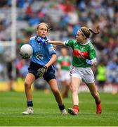 10 August 2019; Sophie English, Mount Anville PS, Stillorgan, Dublin, in action against Caoimhe Kelly, Mullaghrafferty, Carrickmacross, Monaghan, representing Mayo, during the INTO Cumann na mBunscol GAA Respect Exhibition Go Games during the GAA Football All-Ireland Senior Championship Semi-Final match between Dublin and Mayo at Croke Park in Dublin. Photo by Ray McManus/Sportsfile