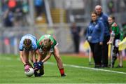 10 August 2019; Layla Stafford, Glynn NS Glynn, Wexford, representing Dublin, in action against Lilly Murray, Ballymurray NS, Ballymurray, Roscommon, representing Mayo, during the INTO Cumann na mBunscol GAA Respect Exhibition Go Games during the GAA Football All-Ireland Senior Championship Semi-Final match between Dublin and Mayo at Croke Park in Dublin. Photo by Piaras Ó Mídheach/Sportsfile