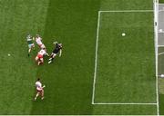 11 August 2019; Stephen O'Brien of Kerry scores his side's first goal of the game despite the efforts of Ronan McNamee of Tyrone during the GAA Football All-Ireland Senior Championship Semi-Final match between Kerry and Tyrone at Croke Park in Dublin Photo by Stephen McCarthy/Sportsfile