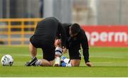 13 August 2019; Patrick Hoban of Dundalk adjusts strapping on his ankle with the help of Dundalk assistant head coach Ruaidhri Higgins ahead of the UEFA Europa League 3rd Qualifying Round 2nd Leg match between Dundalk and SK Slovan Bratislava at Tallaght Stadium in Tallaght, Dublin. Photo by Eóin Noonan/Sportsfile