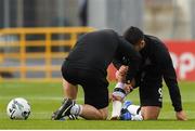 13 August 2019; Patrick Hoban of Dundalk adjusts strapping on his ankle with the help of Dundalk assistant head coach Ruaidhri Higgins ahead of the UEFA Europa League 3rd Qualifying Round 2nd Leg match between Dundalk and SK Slovan Bratislava at Tallaght Stadium in Tallaght, Dublin. Photo by Eóin Noonan/Sportsfile