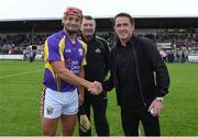 13 August 2019; Lee Chin of team Jim Bolger with the official match starter Tony McCoy, right, and referee Jimmy Barry-Murphy before the eighth annual Hurling for Cancer Research, a celebrity hurling match in aid of the Irish Cancer Society in St Conleth’s Park, Newbridge. The event, organised by legendary racehorse trainer Jim Bolger and National Hunt jockey Davy Russell, has raised €830,000 to date to fund the Irish Cancer Society’s innovative cancer research projects. The final score was: Jim Bolger’s Best: 15, Davy Russell’s Stars 15. St Conleth’s Park, Newbridge, Co Kildare. Photo by Matt Browne/Sportsfile