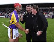 13 August 2019; Lee Chin of team Jim Bolger with the official match starter Tony McCoy and referee Jimmy Barry-Murphy before the eighth annual Hurling for Cancer Research, a celebrity hurling match in aid of the Irish Cancer Society in St Conleth’s Park, Newbridge. The event, organised by legendary racehorse trainer Jim Bolger and National Hunt jockey Davy Russell, has raised €830,000 to date to fund the Irish Cancer Society’s innovative cancer research projects. The final score was: Jim Bolger’s Best: 15, Davy Russell’s Stars 15. St Conleth’s Park, Newbridge, Co Kildare. Photo by Matt Browne/Sportsfile