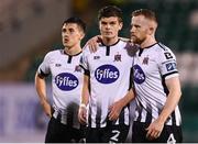 13 August 2019; Dejected Dundalk players, from left, Jamie McGrath, Seán Gannon and Seán Hoare following the UEFA Europa League 3rd Qualifying Round 2nd Leg match between Dundalk and SK Slovan Bratislava at Tallaght Stadium in Tallaght, Dublin. Photo by Stephen McCarthy/Sportsfile