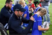 14 August 2019; Leinster player Fergus McFadden signs an autograph for a participant during the Bank of Ireland Leinster Rugby Summer Camp in Ashbourne Rugby Club. Photo by Piaras Ó Mídheach/Sportsfile