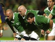 11 October 2003; The Ireland front row of John Hayes, left, Keith Wood, and Reggie Corrigan, in action against Romania. 2003 Rugby World Cup, Pool A, Ireland v Romania, Central Coast Stadium, Gosford, New South Wales, Australia. Picture credit; Brendan Moran / SPORTSFILE *EDI*