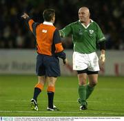 11 October 2003; Ireland captain Keith Wood has a word with referee Jonathan Kaplan. 2003 Rugby World Cup, Pool A, Ireland v Romania, Central Coast Stadium, Gosford, New South Wales, Australia. Picture credit; Brendan Moran / SPORTSFILE *EDI*