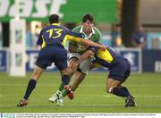 11 October 2003; Shane Horgan, Ireland, in action against Valentin Maftei (13) and Romeo Gintineac, Romania. 2003 Rugby World Cup, Pool A, Ireland v Romania, Central Coast Stadium, Gosford, New South Wales, Australia. Picture credit; Brendan Moran / SPORTSFILE *EDI*