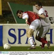 7 November 2003; Keith Dunne, St. Patrick's Athletic, in action against Eoin Heary, Shelbourne. eircom League Premier Division, St. Patrick's Athletic v Shelbourne, Richmond Park, Dublin. Soccer. Picture credit; David Maher / SPORTSFILE *EDI*