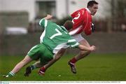 8 November 2003; Declan Lally, St. Brigid's, in action against St. Patrick's  Johnny Holland. AIB Leinster Club Football Championship, St. Patrick's v St Brigid's, St Brigid's Park, Dundalk, Co. Louth. Picture credit; Ray McManus / SPORTSFILE *EDI*