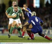9 November 2003; Kevin Maggs, Ireland, in action against Frederic Michalak and Serge Betsen (6), France. 2003 Rugby World Cup, Quarter Final, France v Ireland, Telstra Dome, Melbourne, Victoria, Australia. Picture credit; Brendan Moran / SPORTSFILE *EDI*