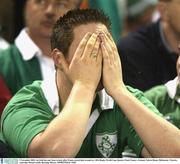 9 November 2003; An Irish fan can't bear to look after France scored their second try. 2003 Rugby World Cup, Quarter Final, France v Ireland, Telstra Dome, Melbourne, Victoria, Australia. Picture credit; Brendan Moran / SPORTSFILE *EDI*