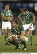9 November 2003; Dejected Ireland players Simon Easterby, front, Girvan Dempsey and John Kelly moments before the final whistle. 2003 Rugby World Cup, Quarter Final, France v Ireland, Telstra Dome, Melbourne, Victoria, Australia. Picture credit; Brendan Moran / SPORTSFILE *EDI*