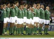 9 November 2003; The Ireland stand together and sing &quot; Ireland's Call &quot; before the game. 2003 Rugby World Cup, Quarter Final, France v Ireland, Telstra Dome, Melbourne, Victoria, Australia. Picture credit; Brendan Moran / SPORTSFILE *EDI*