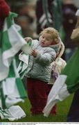 8 November 2003; A young St. Brigid's supporter adjusts her colours. AIB Leinster Club Football Championship, St. Patrick's v St Brigid's, St Brigid's Park, Dundalk, Co. Louth. Picture credit; Ray McManus / SPORTSFILE *EDI*