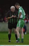 8 November 2003; Referee Jim Smith takes the name of Dessie Finnegan, St. Patrick's. AIB Leinster Club Football Championship, St. Patrick's v St Brigid's, St Brigid's Park, Dundalk, Co. Louth. Picture credit; Ray McManus / SPORTSFILE *EDI*