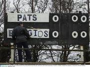 8 November 2003; The scoreboard operator fixes the names before the start of the game. AIB Leinster Club Football Championship, St. Patrick's v St Brigid's, St Brigid's Park, Dundalk, Co. Louth. Picture credit; Ray McManus / SPORTSFILE *EDI*