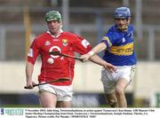 9 November 2003; John King, Newtownshandrum, in action against Toomevara's Ken Dunne. AIB Munster Club Senior Hurling Championship Semi-Final, Toomevara v Newtownshandrum, Semple Stadium, Thurles, Co. Tipperary. Picture credit; Pat Murphy / SPORTSFILE *EDI*