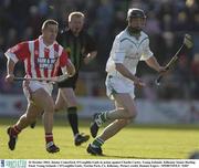 26 October 2003; Jimmy Comerford, O'Loughlin Gaels in action against Charlie Carter, Young Irelands. Kilkenny Senior Hurling Final. Young Irelands v O'Loughlin Gaels, Nowlan Park, Co. Kilkenny. Picture credit; Damien Eagers / SPORTSFILE *EDI*