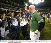 9 November 2003; Ireland captain Keith Wood waves at the crowd and photographers as he leaves the field after defeat by France. 2003 Rugby World Cup, Quarter Final, France v Ireland, Telstra Dome, Melbourne, Victoria, Australia. Picture credit; Brendan Moran / SPORTSFILE *EDI*