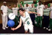 14 November 2003; Jemile Martinez from Fossetts circus juggles with a basketball and a soccer ball at the launch of the Shamrock Rovers basketball team as players from both the basketball and the soccer teams look on. Picture credit; Matt Browne / SPORTSFILE *EDI*