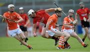 16 June 2013; Gareth Johnson, Down, in action against, from left, Padraig Hughes, Ciaran Clifford and Michael McCullogh, Armagh. Ulster GAA Hurling Senior Championship Quarter-Final, Down v Armagh, Páirc Esler, Newry, Co. Down. Picture credit: Brian Lawless / SPORTSFILE