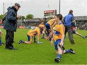 16 June 2013; Clare manager Mick O'Dwyer with Martin McMahon and his players after the game. Munster GAA Football Senior Championship Semi-Final, Clare v Cork, Cusack Park, Ennis, Co. Clare. Picture credit: Matt Browne / SPORTSFILE