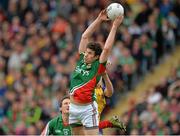16 June 2013; Alan Freeman, Mayo, with support from team-mate Alan Dillon, cathes a high ball against Neil Collins, Roscommon. Connacht GAA Football Senior Championship Semi-Final, Mayo v Roscommon, Elverys MacHale Park, Castlebar, Co. Mayo. Picture credit: Barry Cregg / SPORTSFILE