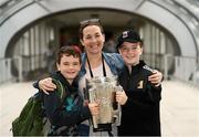 16 August 2019; Róisín Fox with her sons 9 year old Darragh, left, and 11 year old Cian, from Kilkenny City, with the Liam MacCarthy Cup at the GAA’s Home for the Match stand in the arrivals hall at Dublin Airport. Photo by Ramsey Cardy/Sportsfile