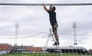 16 August 2019; Bohemians groundsman Noel Cosgrove hangs the nets ahead of the SSE Airtricity League Premier Division match between Bohemians and UCD at Dalymount Park in Dublin. Photo by Sam Barnes/Sportsfile