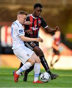 16 August 2019; Paul Doyle of UCD is tackled by Andre Wright of Bohemians during the SSE Airtricity League Premier Division match between Bohemians and UCD at Dalymount Park in Dublin. Photo by Sam Barnes/Sportsfile