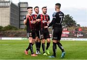 16 August 2019; Conor Levingston of Bohemians, second from left, celebrates with team-mates, from left, Darragh Leahy, Luke Wade-Slater, and Daniel Mandroiu after scoring his side’s second goal, during the SSE Airtricity League Premier Division match between Bohemians and UCD at Dalymount Park in Dublin. Photo by Sam Barnes/Sportsfile